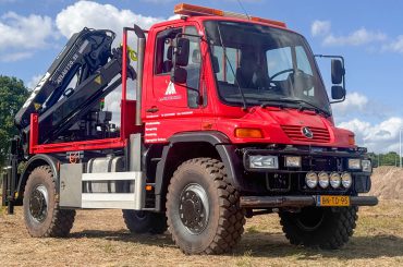 atlas kraan op unimog pater de klomp